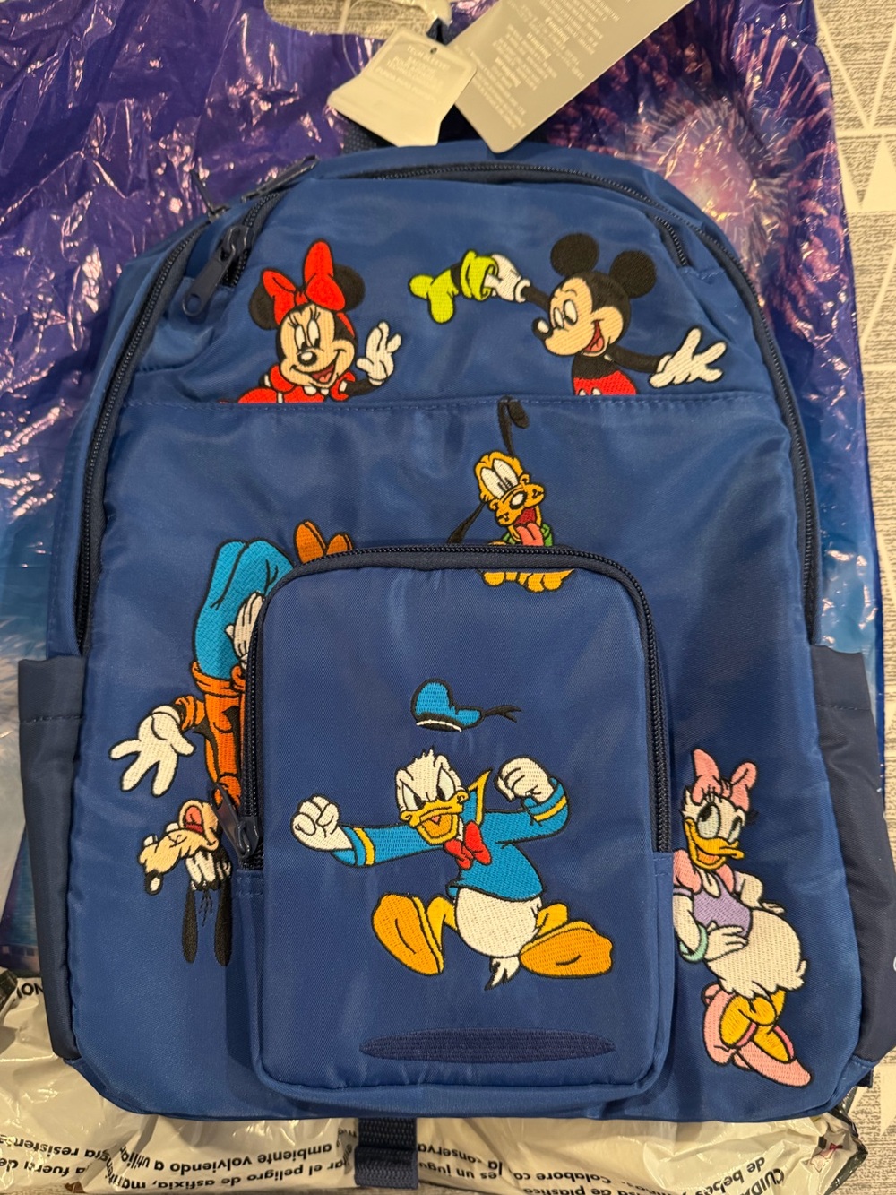 Disney Parks Blue Backpack with Embroidered Classic Characters